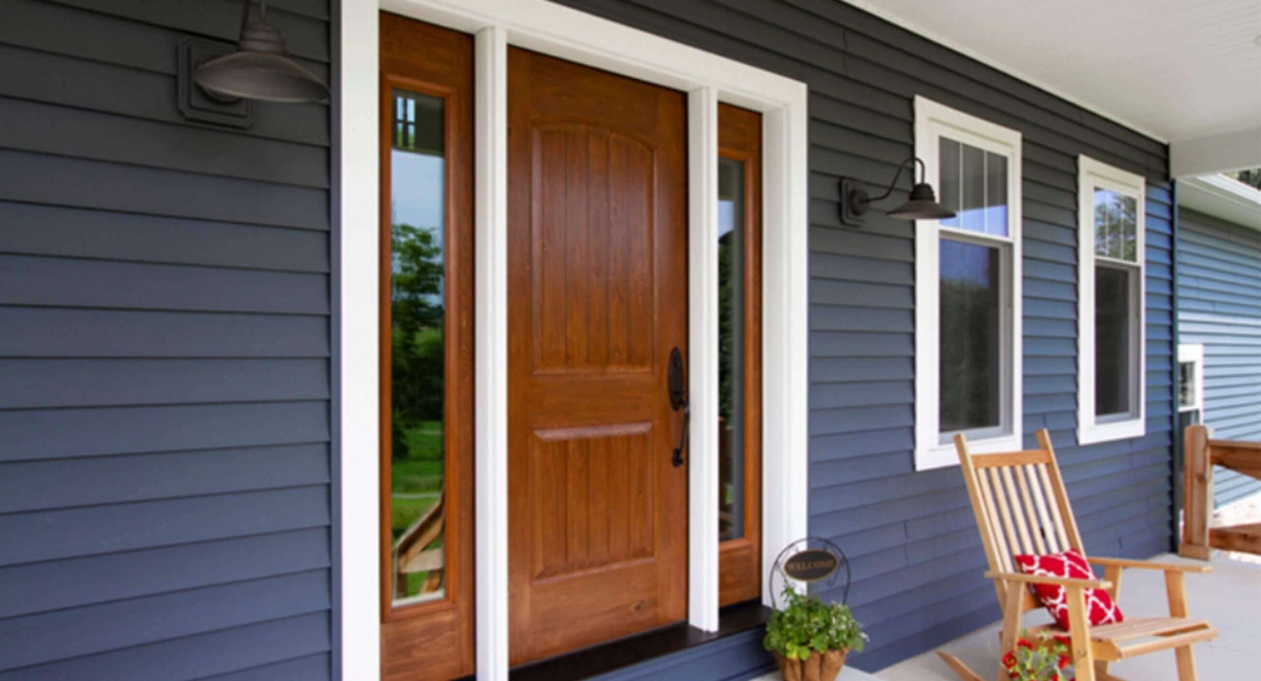 New wood front door with white trim