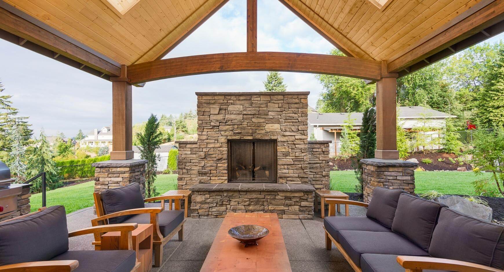 outdoor fireplace in covered patio