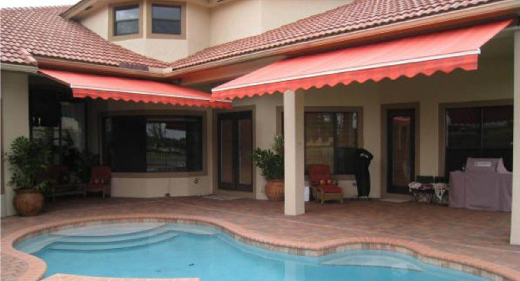 awnings cover patio with pool