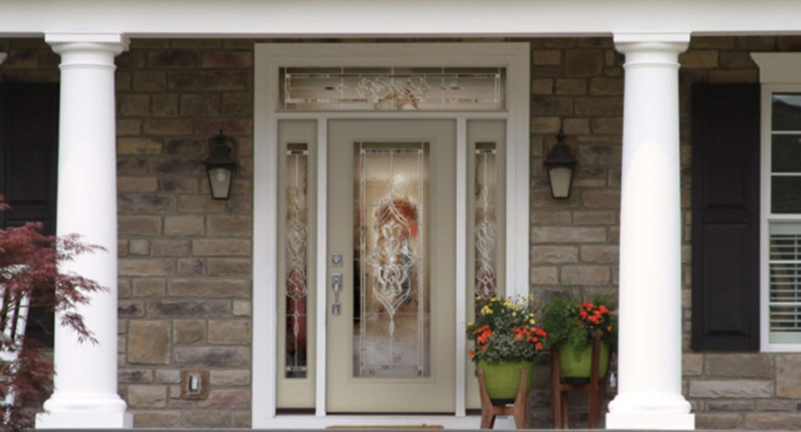 Fiberglass door surrounded by glass panels