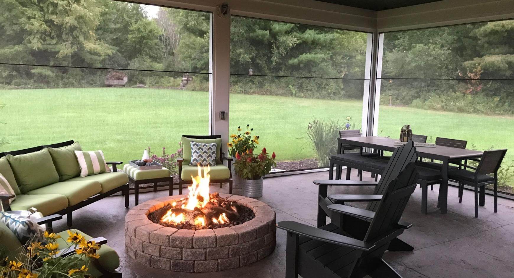 outdoor firepit in screened in patio