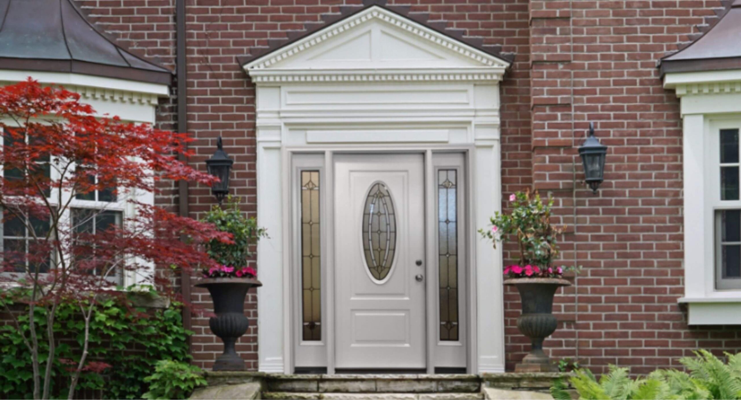 White fiberglass door accentuated with classic columns