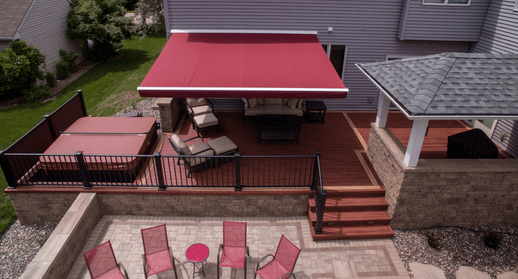 Beautiful red retractable awning seen from above