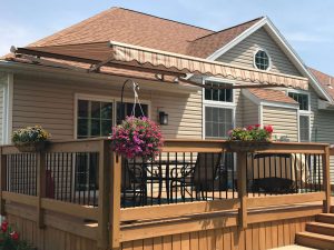 extendable awnings over deck in the summer