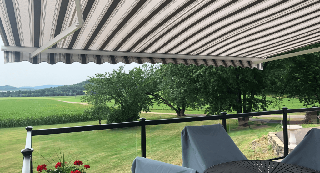 Striped retractable awning from the deck looking out