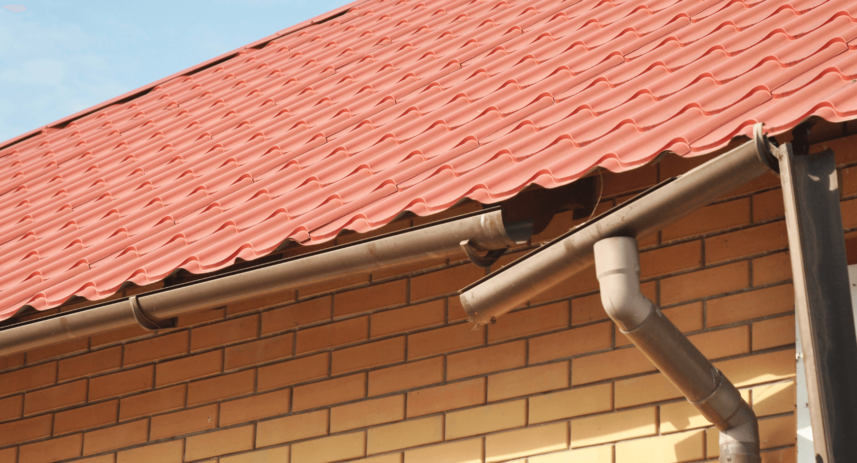Image of gutters that sagged so badly they broke