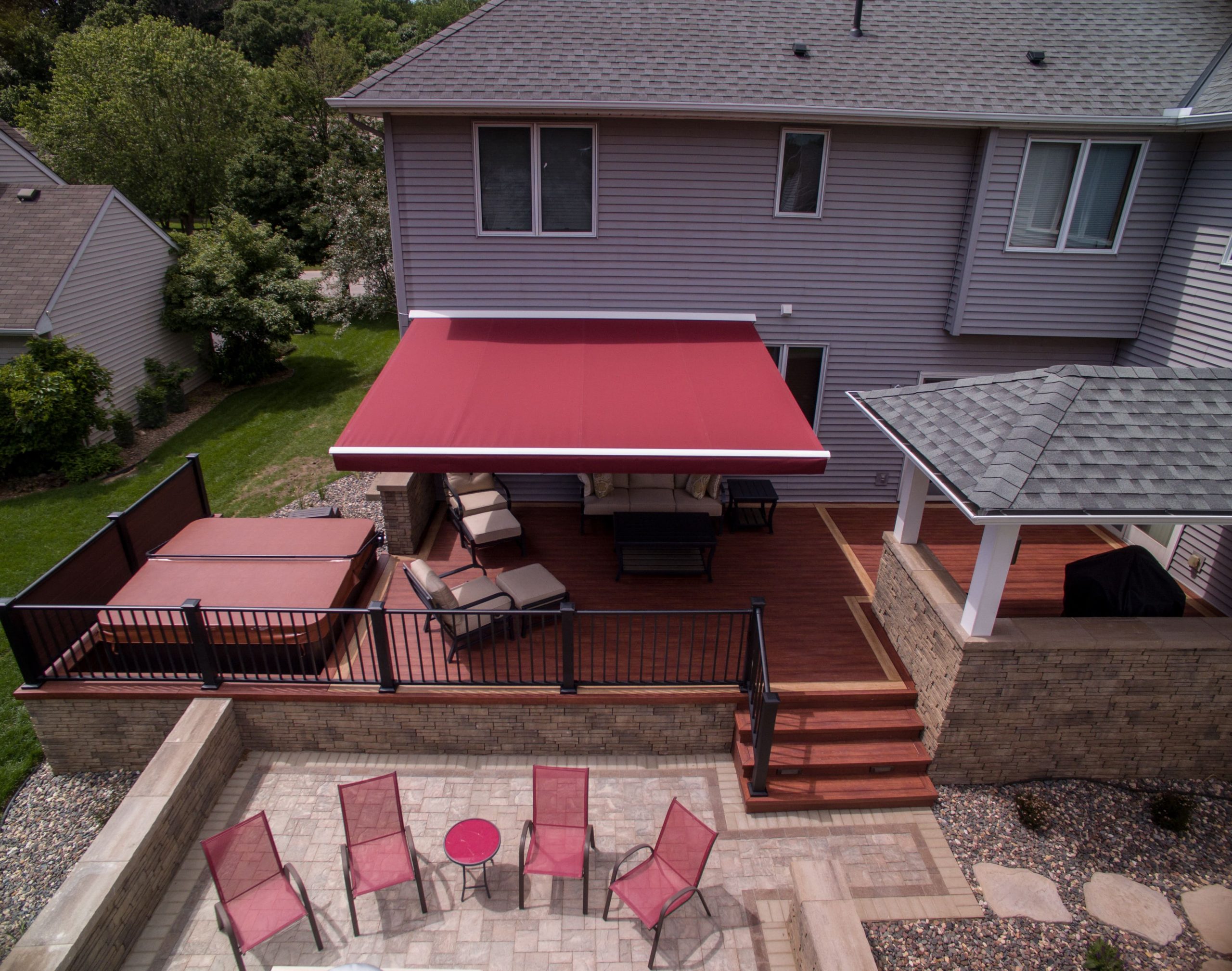 red extendable awning on porch