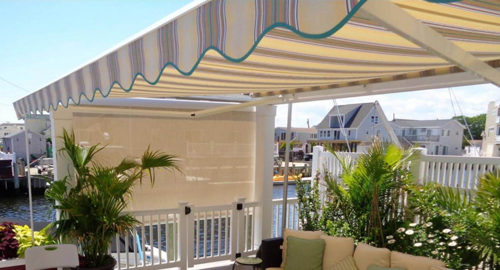 awning and privacy screen covering patio