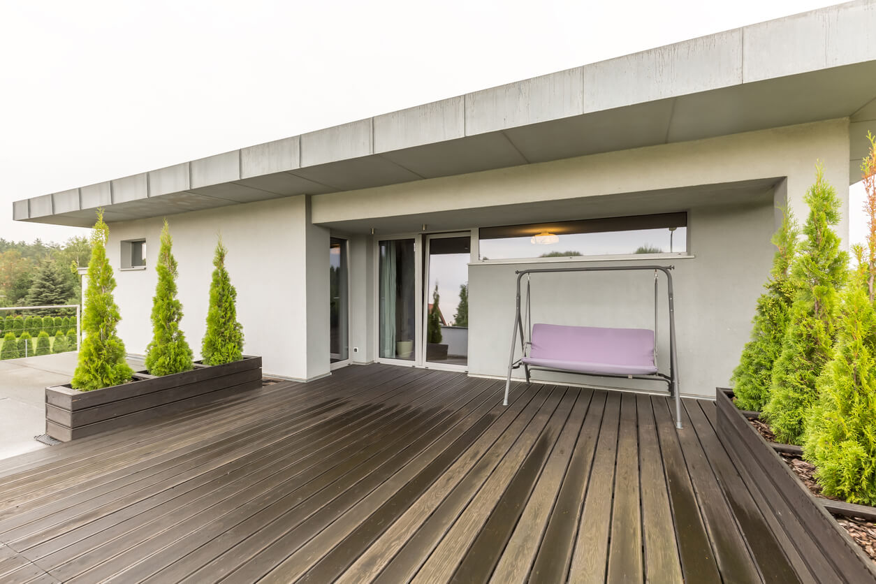 vertical shrubs on a deck