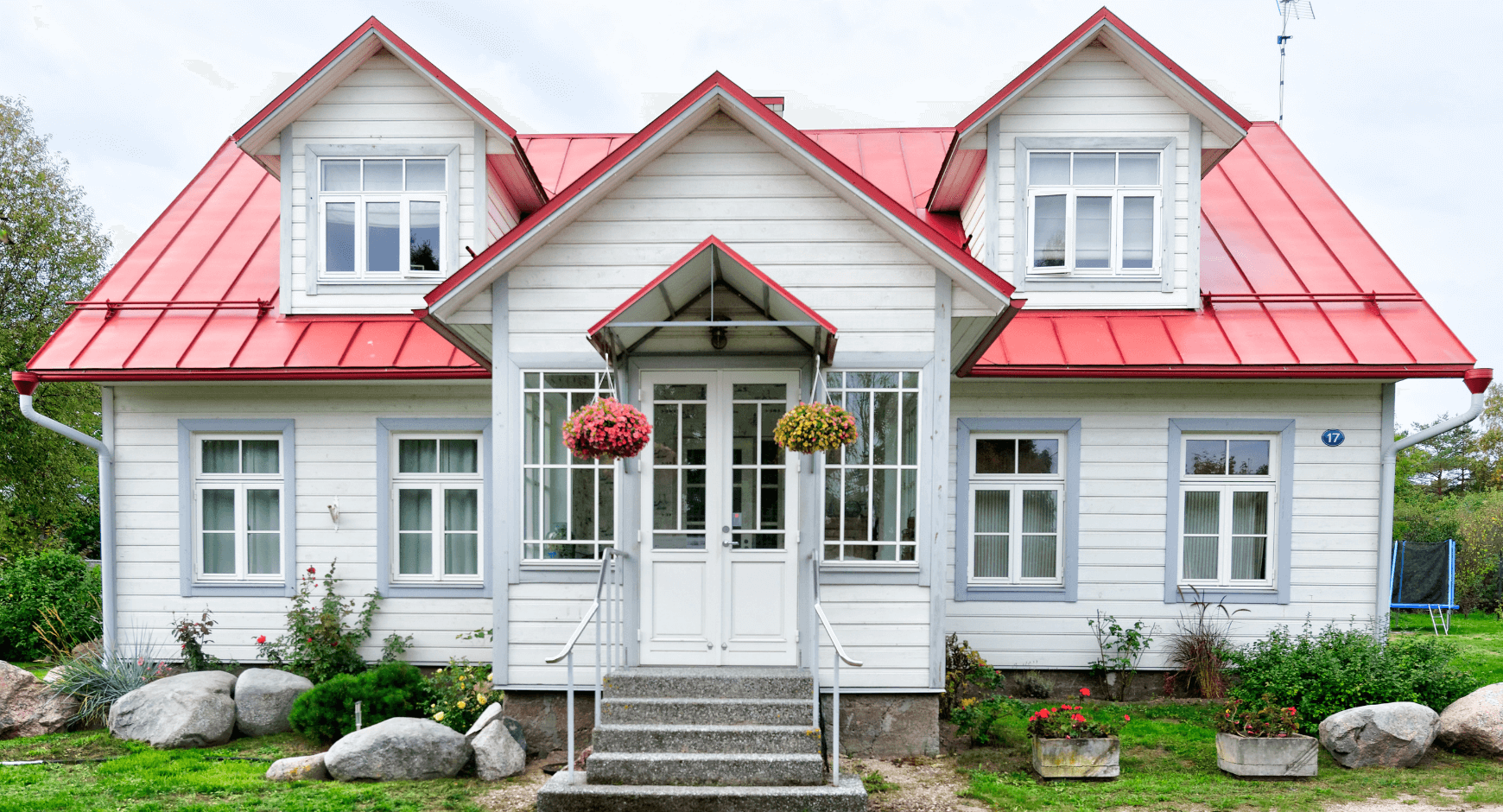Image of a beautiful home with wood exterior window trim