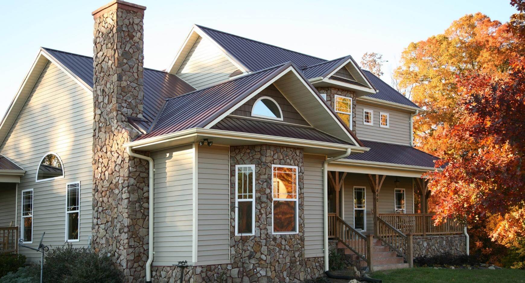 large home framed by continuous gutters