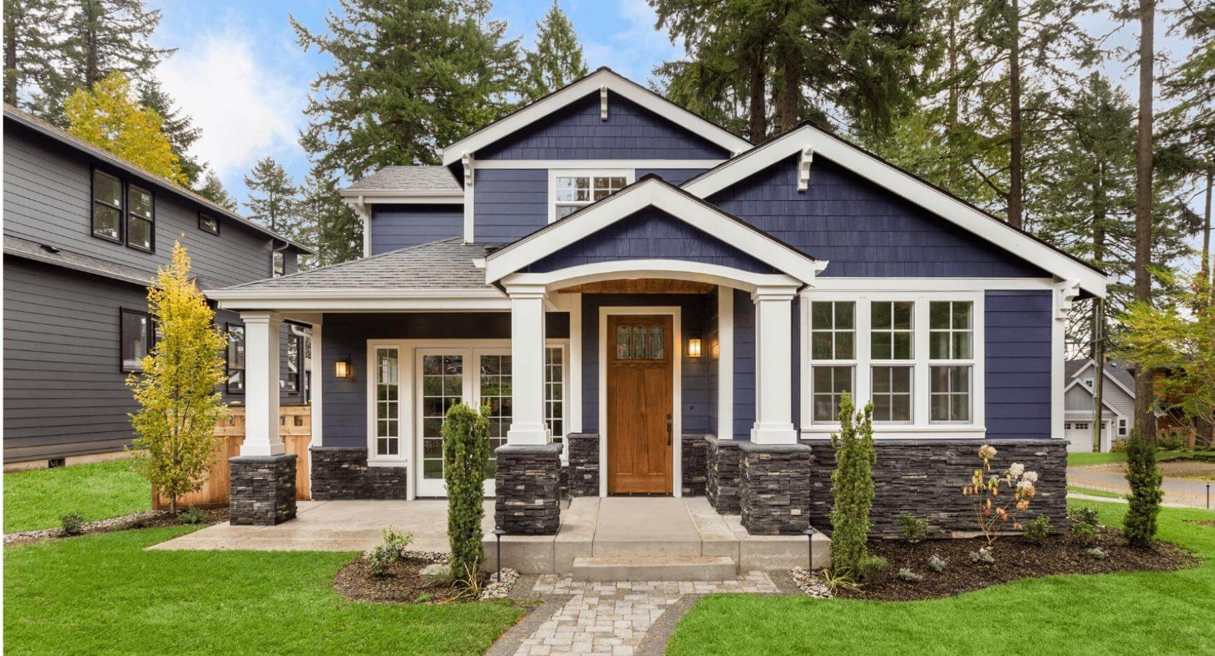 Navy blue house with white trim