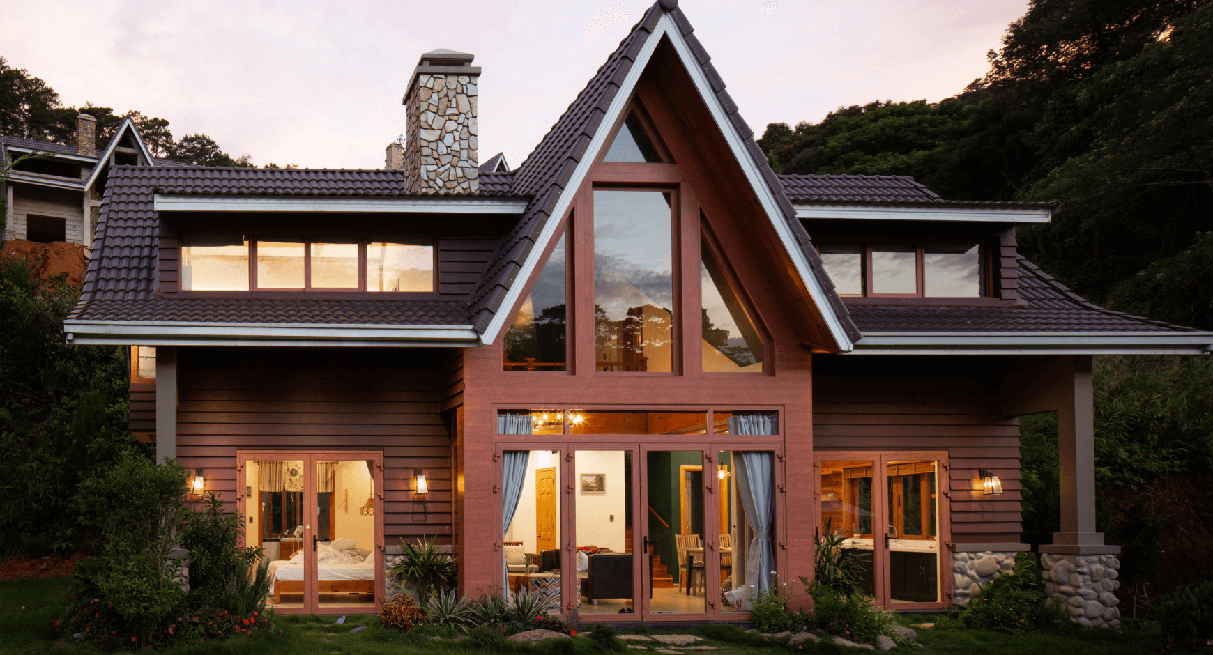 Image of a log-style cabin that has composite siding and trim