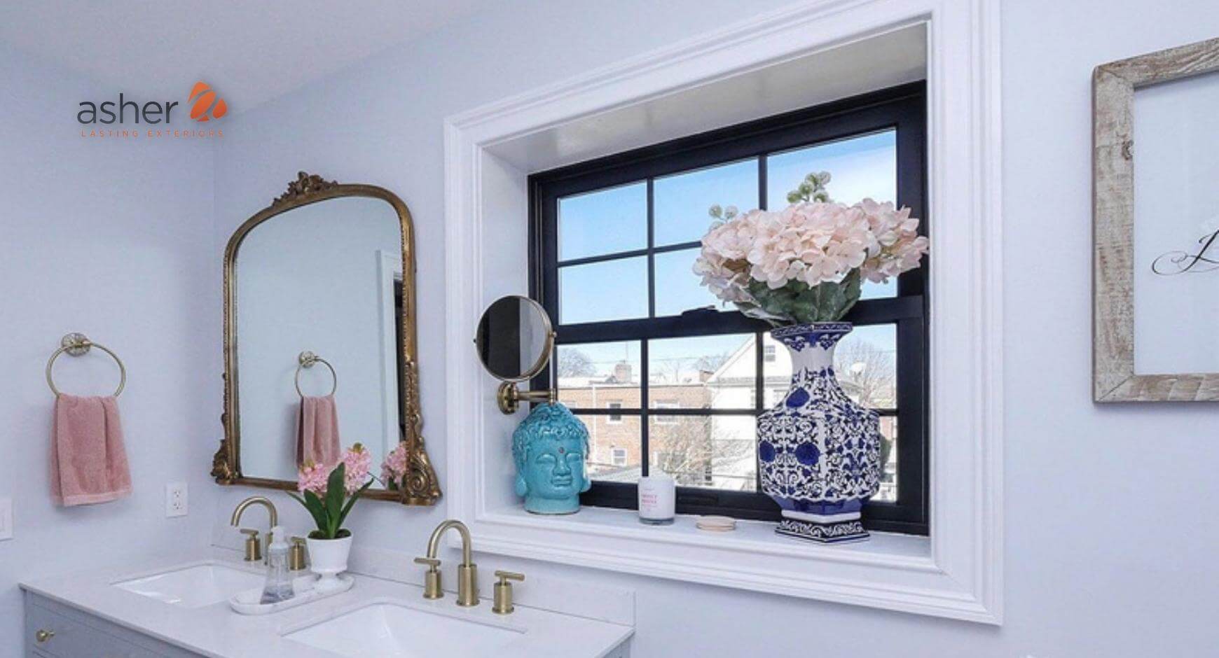 dark framed window behind bathroom sink