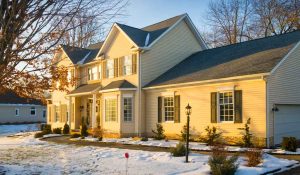 a midwestern home in the winter with winterized energy efficient windows