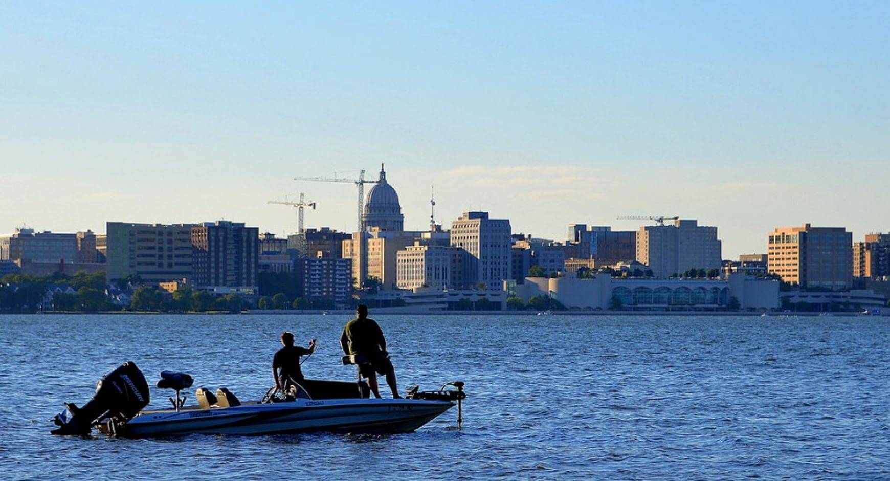 Fishermen with the Madison skyline in the background