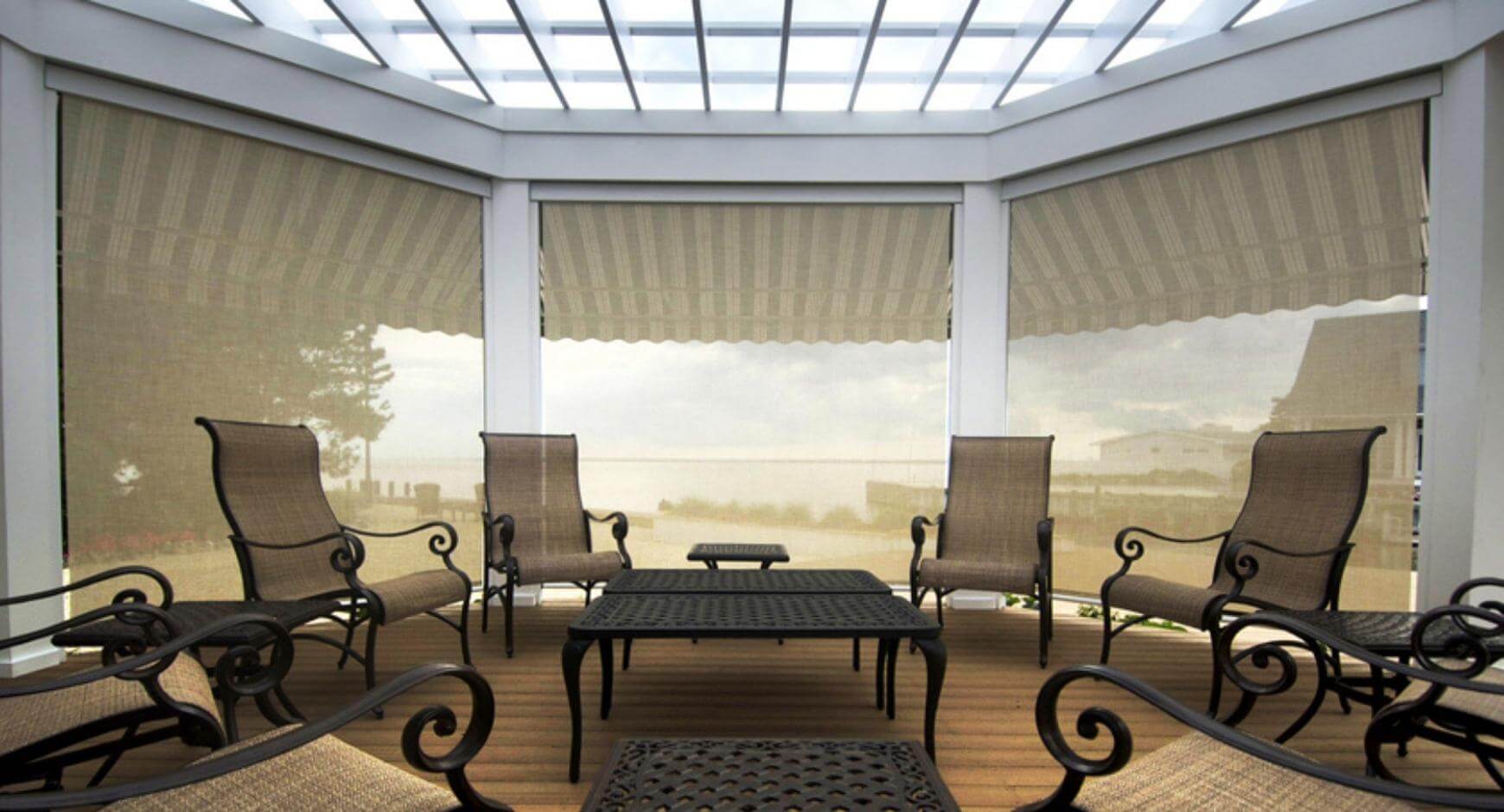 moveable shades and awnings covering sunroom windows