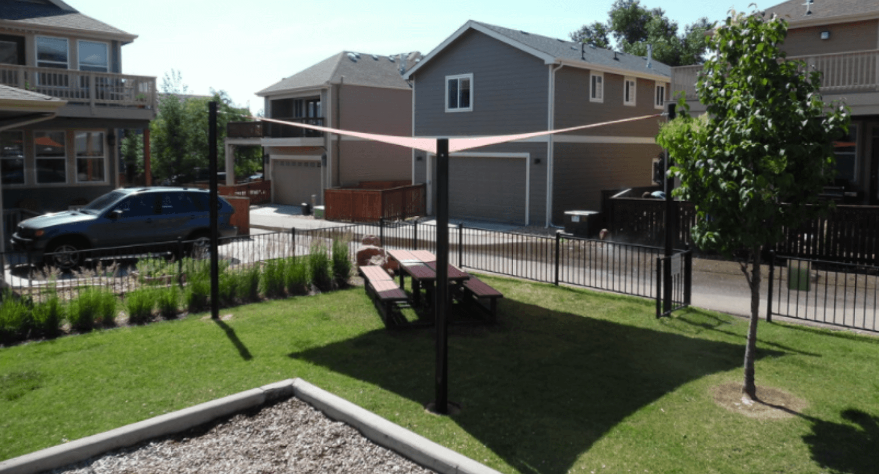 Shade sail covering a yard