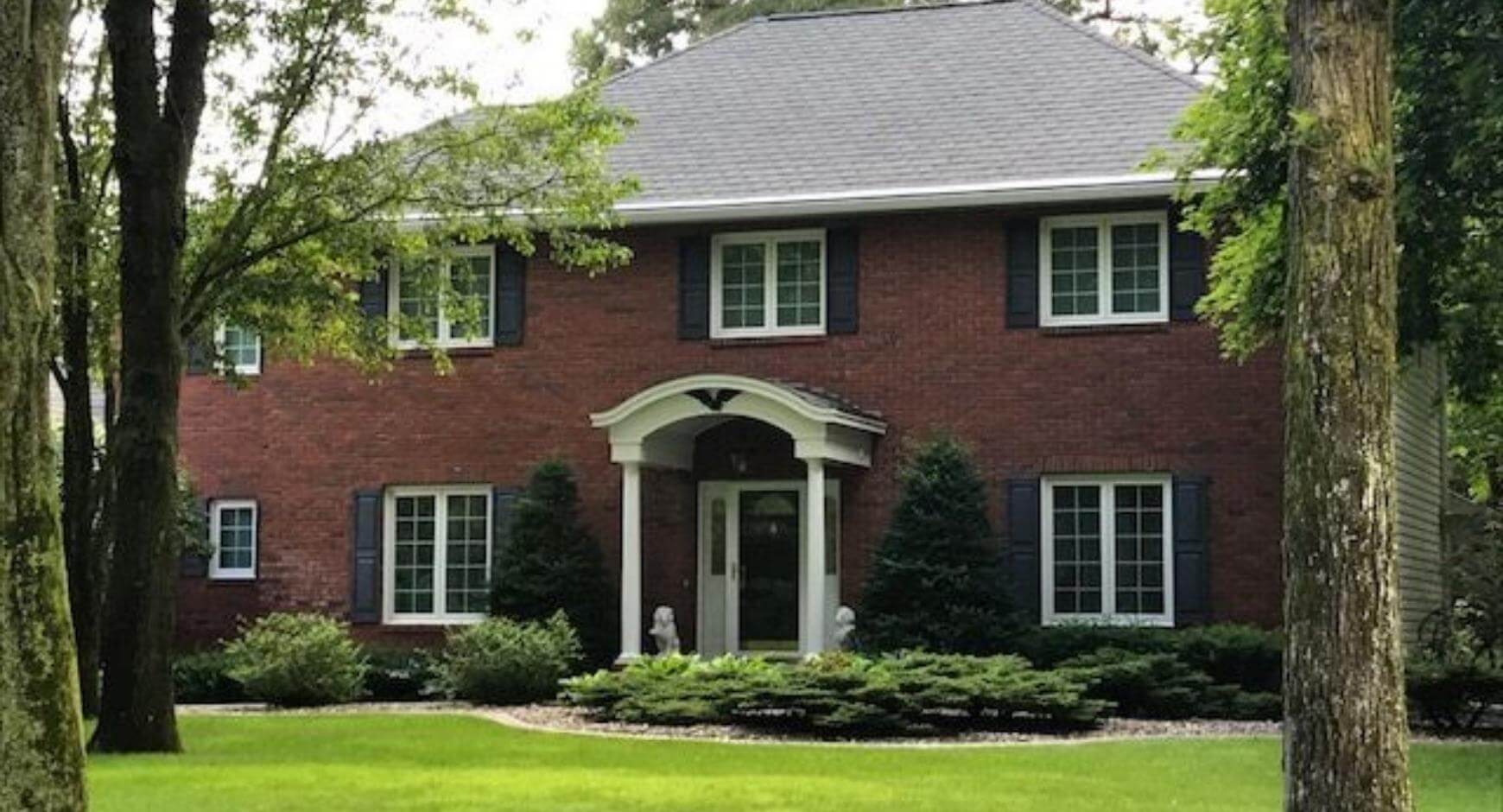 brick home with new windows