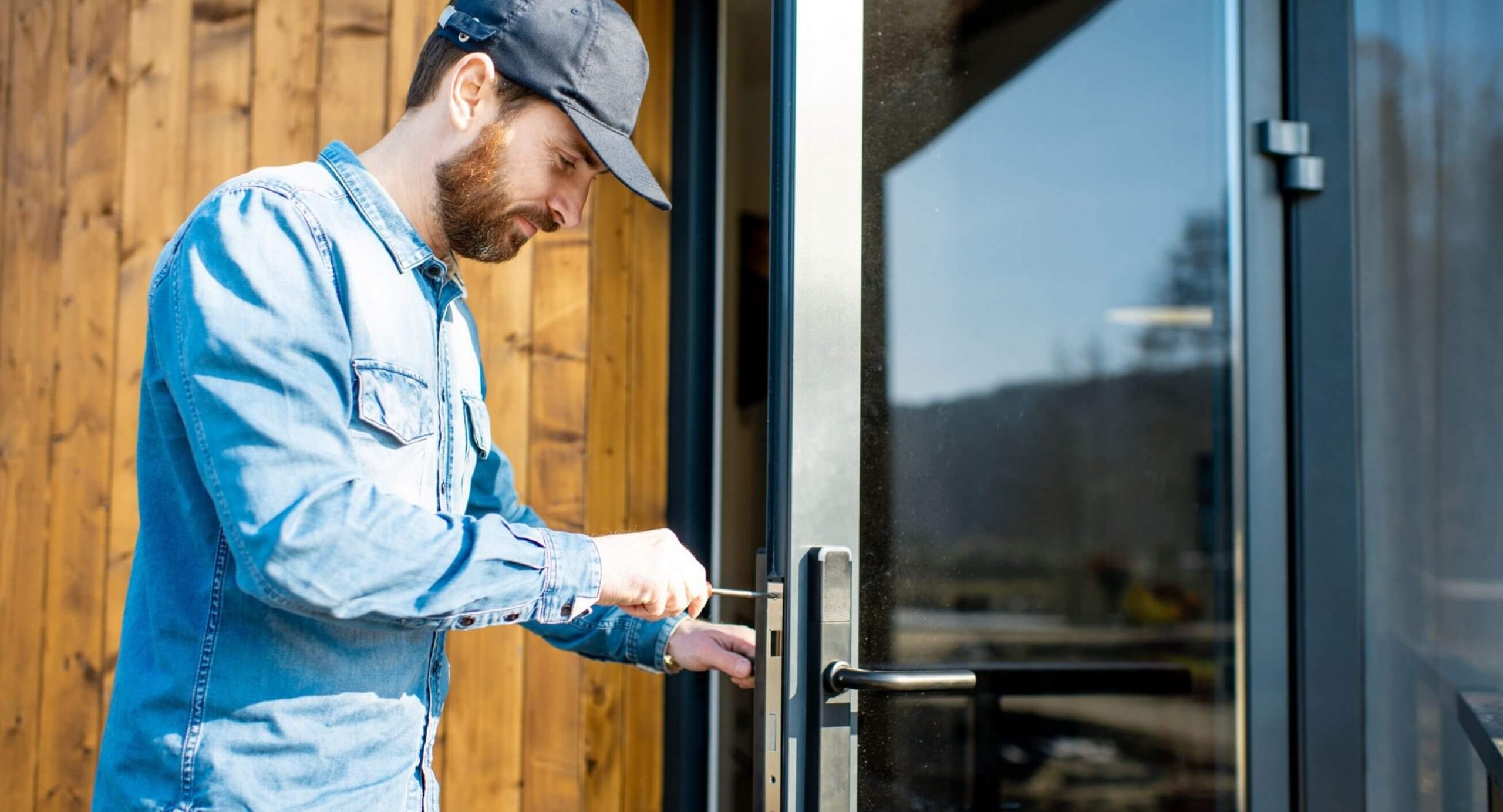 Technician installing a storm door