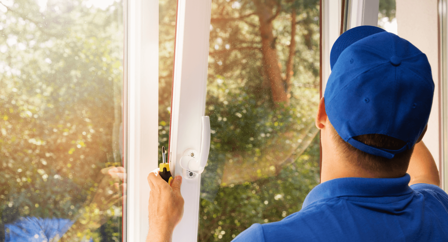 Image of a man installing a window