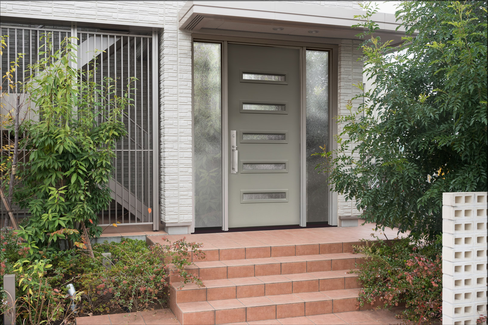 a soft gray steel front entry door to a home