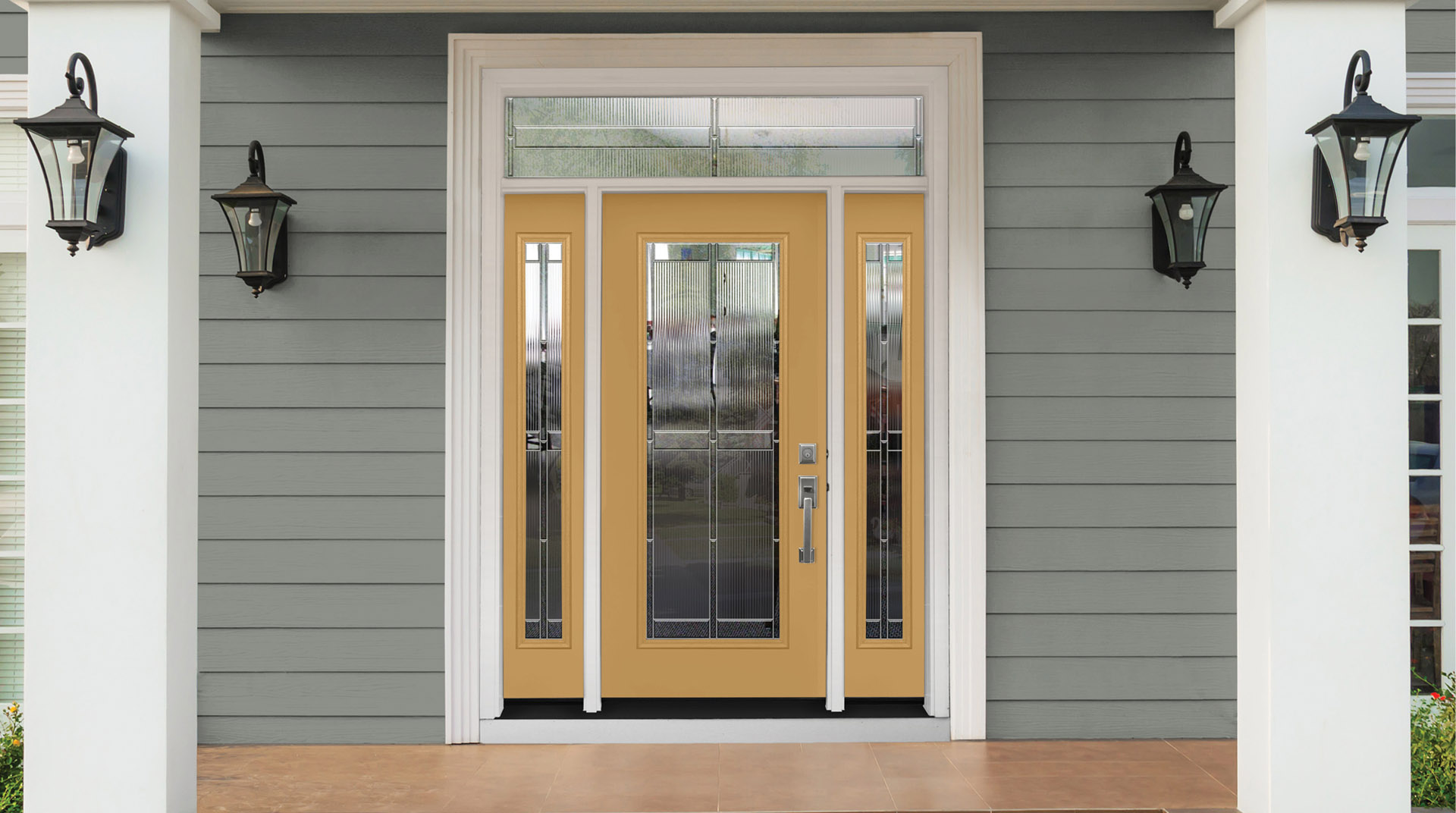 a golden yellow front entry door to a home