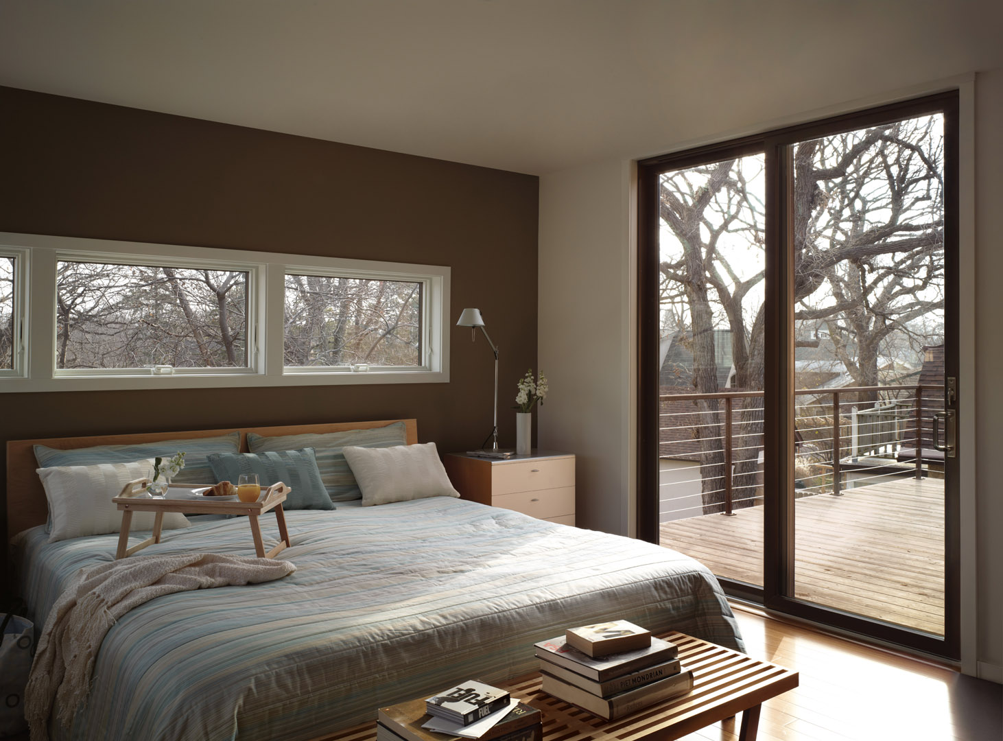 400 Series Awning Windows, White Interior, Contemporary Hardware in White Finish.
200 Series Perma-Shield Gliding Patio Door, Terratone, Anvers Hardware in Satin Nickel Finish.
Modern Home Style
Ranch Home Style