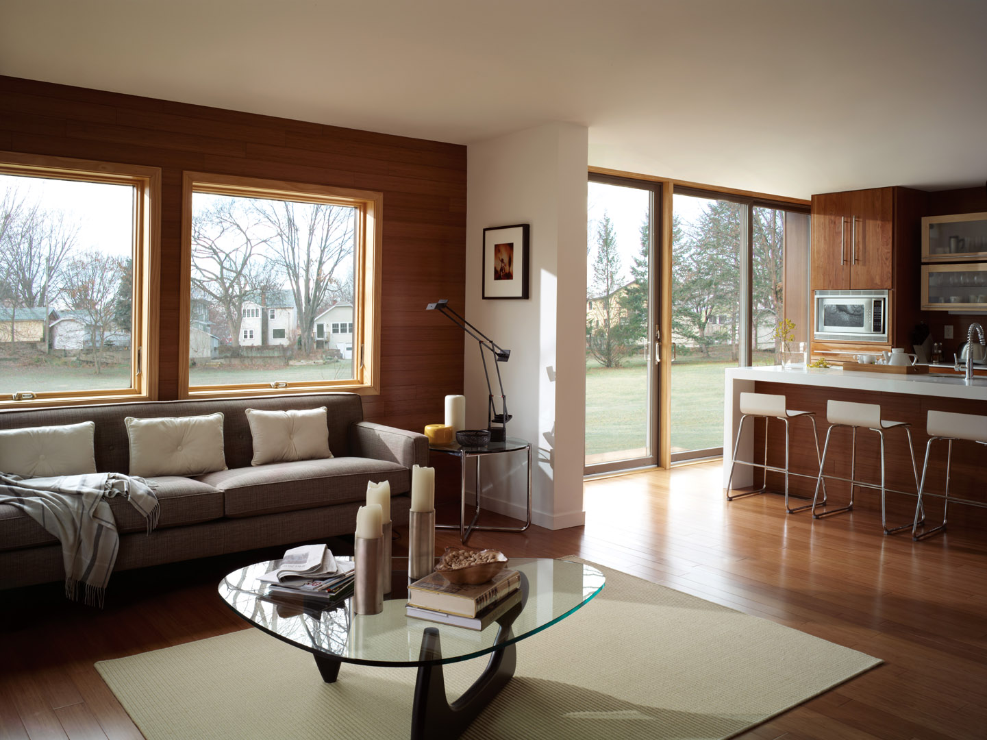 400 Series Awning Windows, Pine Interior, Contemporary Hardware in Satin Nickel Finish. 
200 Series Perma-Shield Gliding Patio Door, Terratone, Anvers Hardware in Satin Nickel Finish
Modern Home Style  
Ranch Home Style