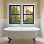 Bathtub in custom designed unfurnished bathroom.