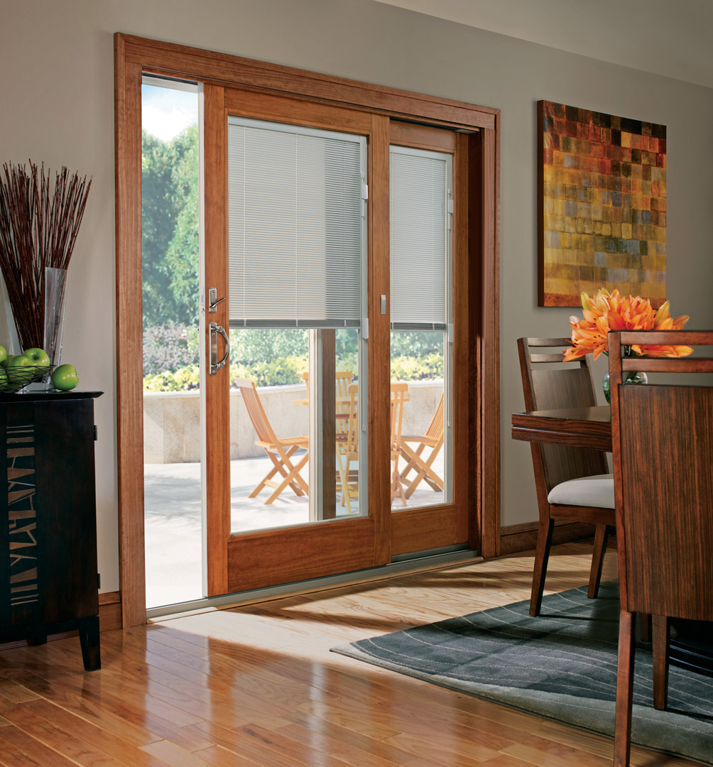 400 Series Frenchwood Gliding Patio Door with Newbury Satin Nickel Hardware, wood interior and blinds between the glass option.