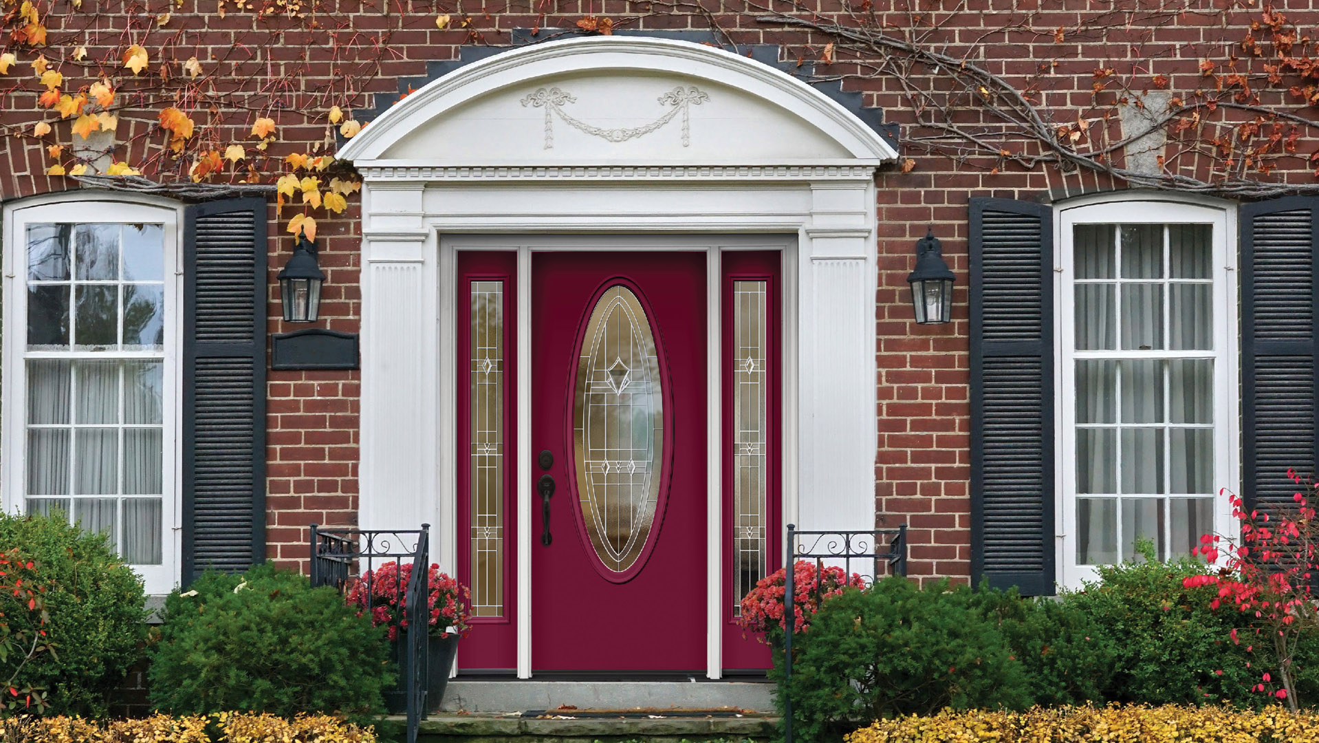 a red front entry door to a home