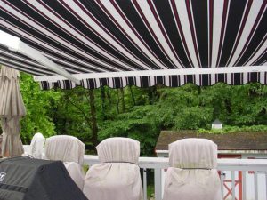 a sunesta awning with a striped color pattern