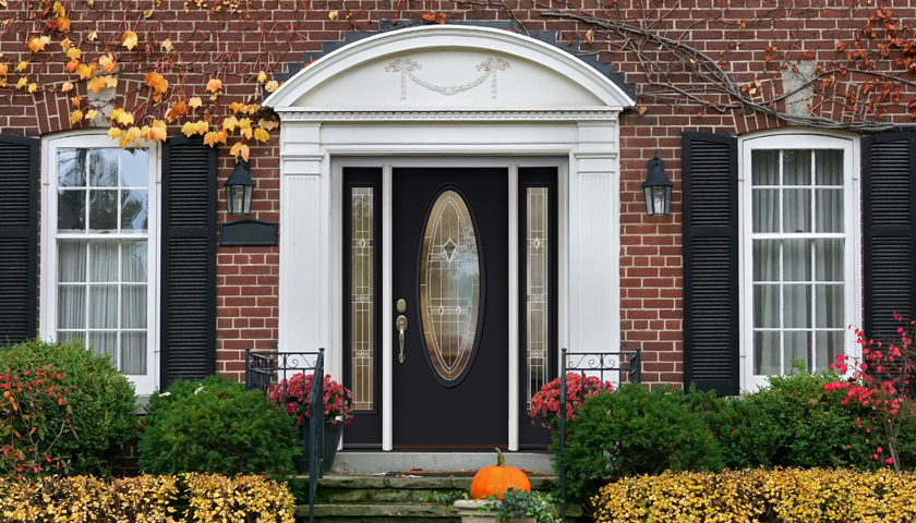 Front of a house with a door and windows