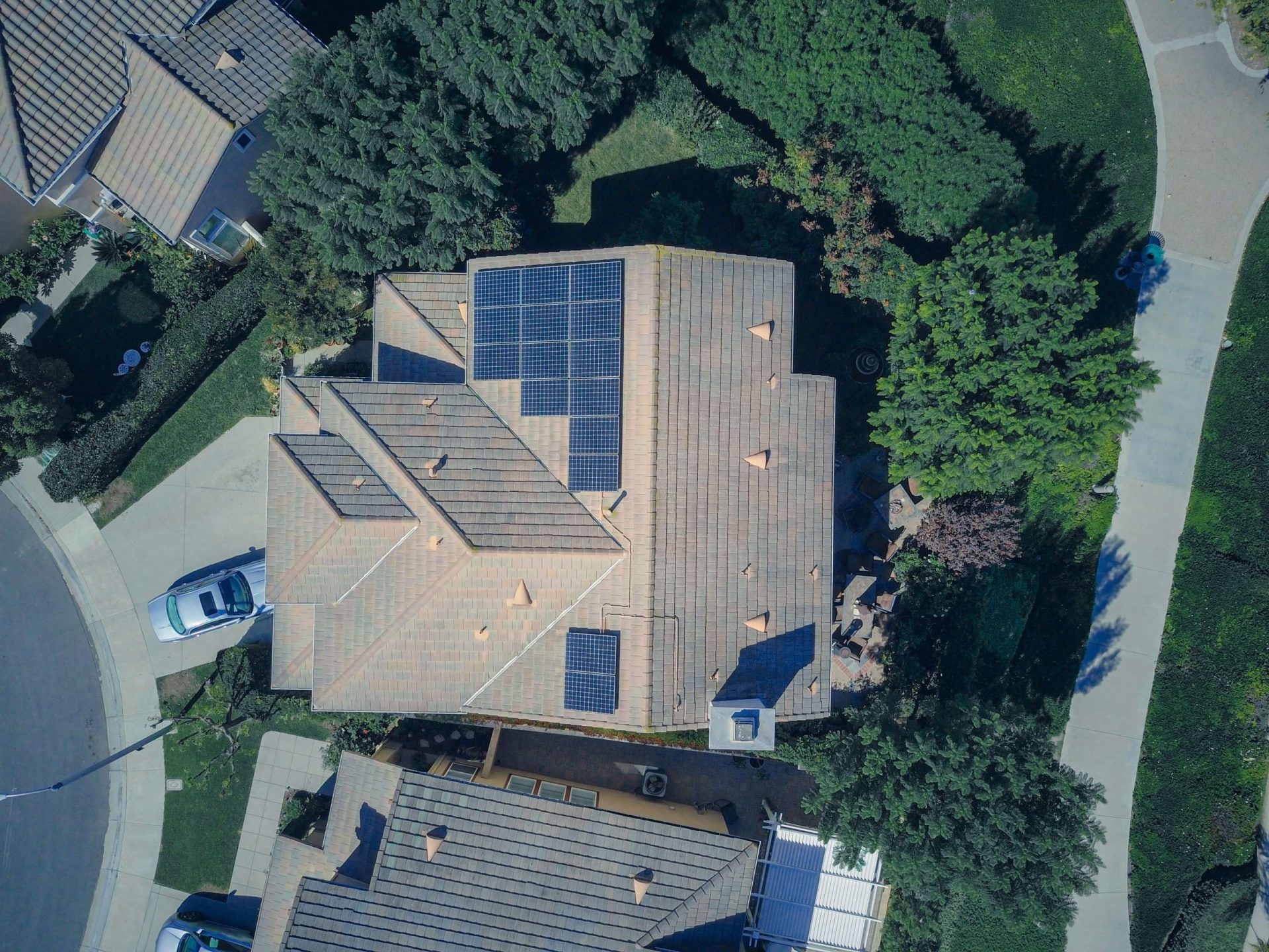 aerial look at a home with solar panels