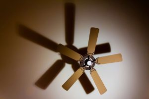a ceiling fan that circulates air on hot days
