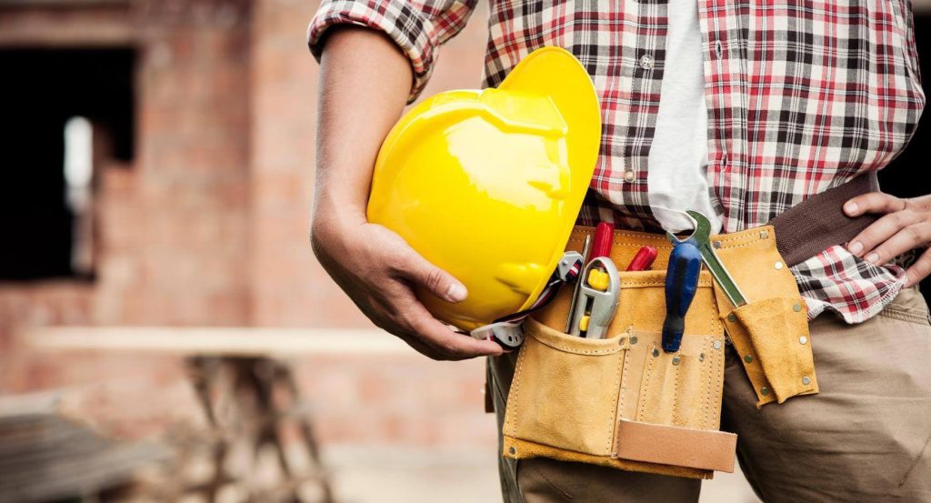 worker with toolbelt and hard hat